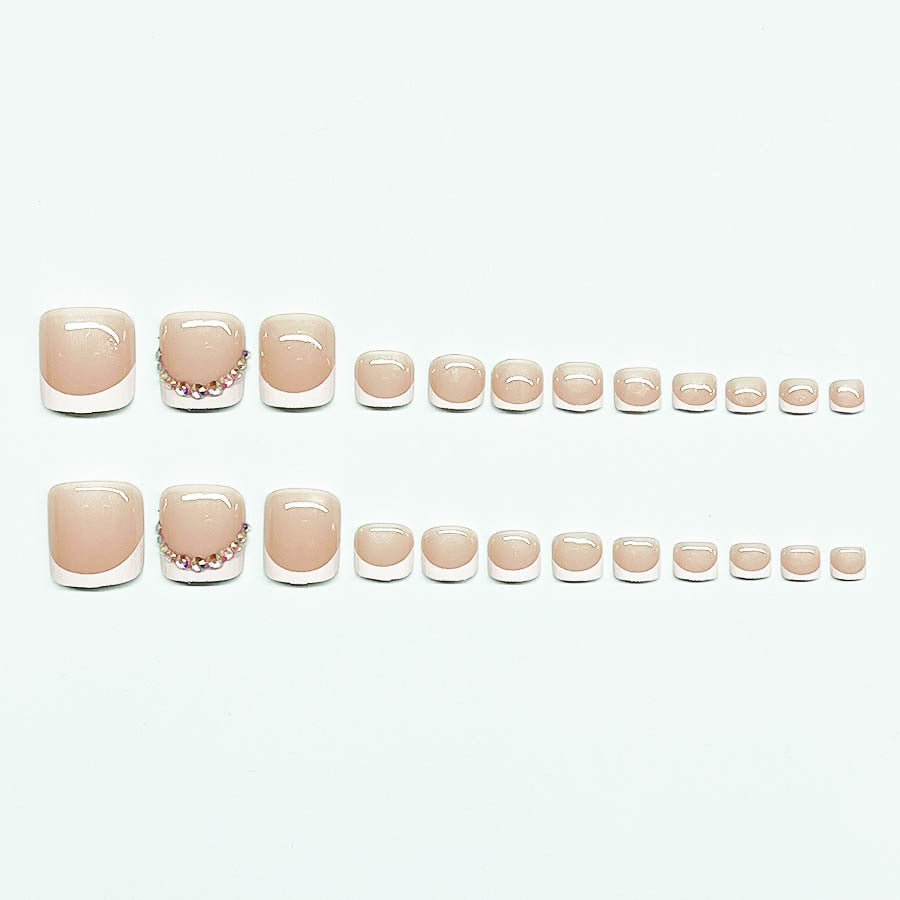 Nail art set with elegant French lace decoration and glitter accents Stornfield
