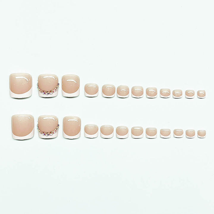 Nail art set with elegant French lace decoration and glitter accents Stornfield