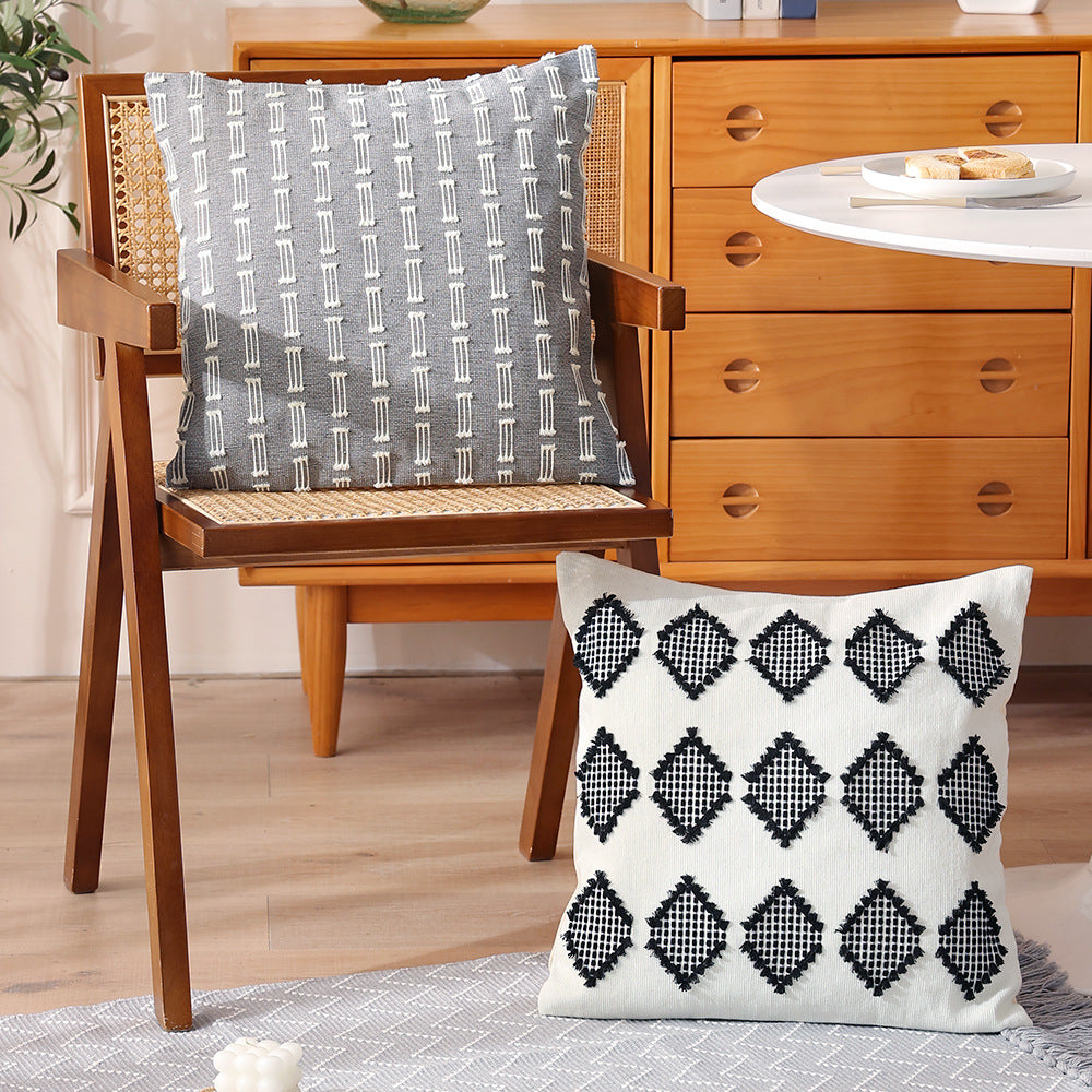 Woven rectangular decorative cushion cover with embroidered geometric pattern