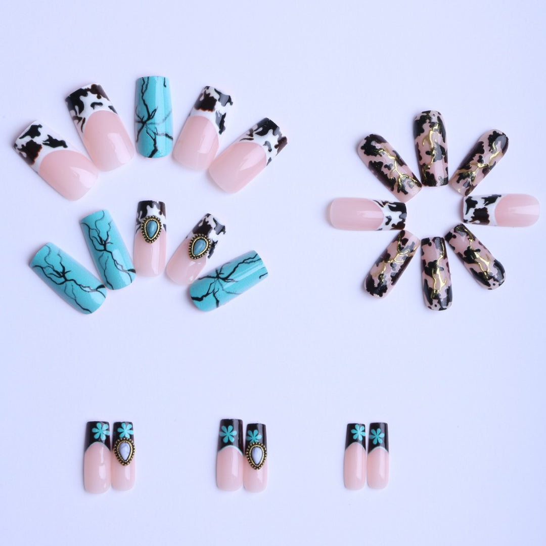 Artful fingernails with unique marble and jewelry design Stornfield