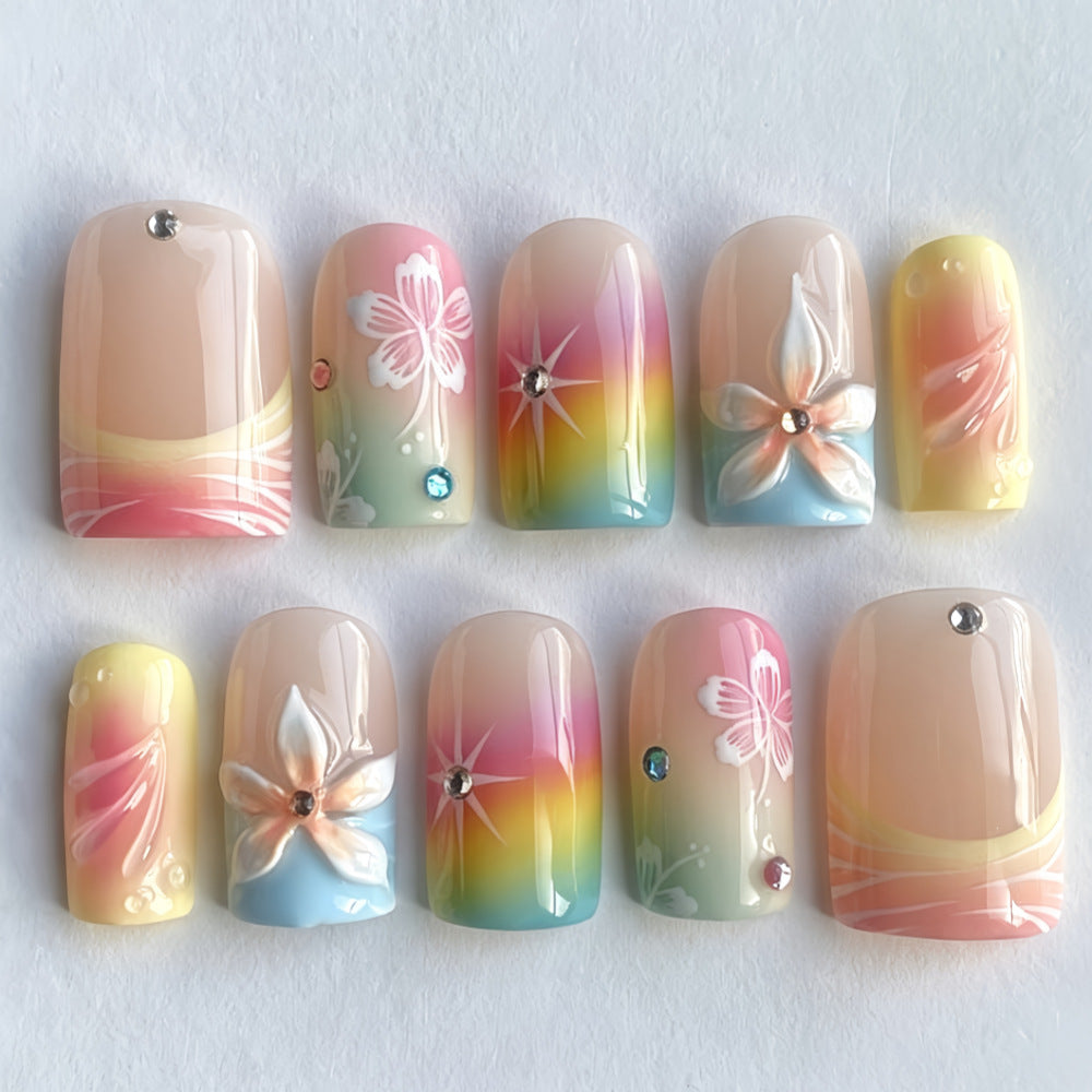 Acrylic nails with floral accents and gradient Stornfield