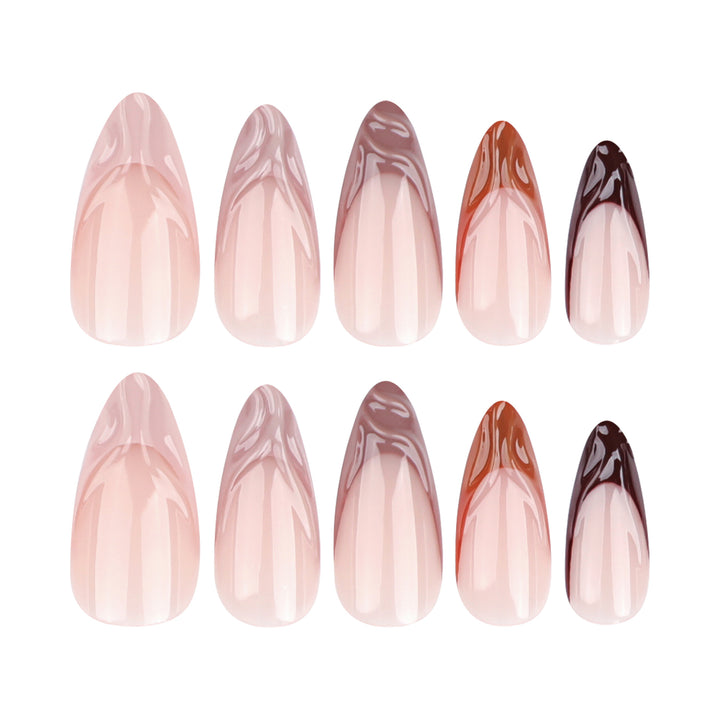 Artful stiletto nails with elegant gradient and glitter accents Stornfield
