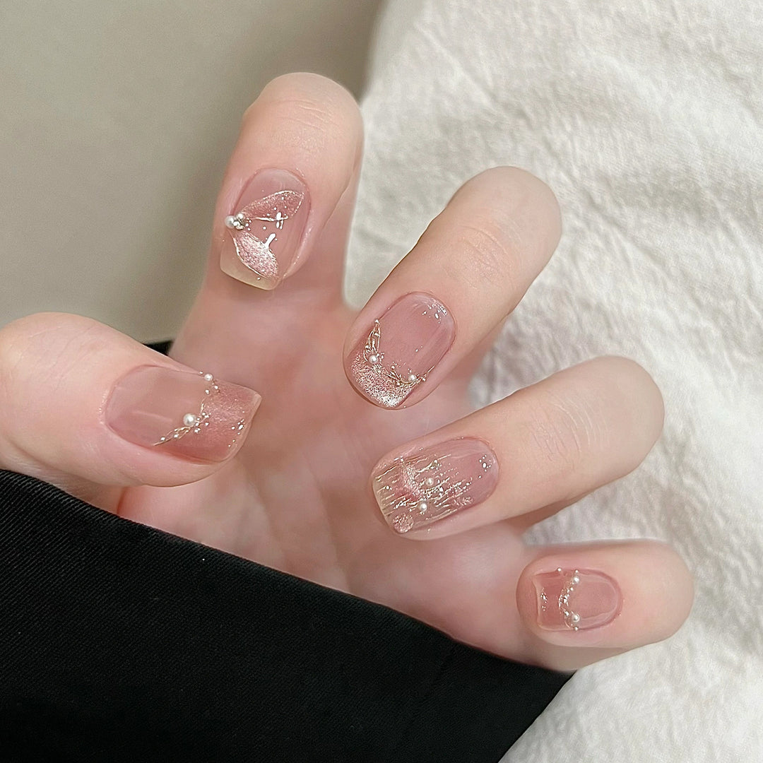 Handmade art nails with delicate embellishments Stornfield