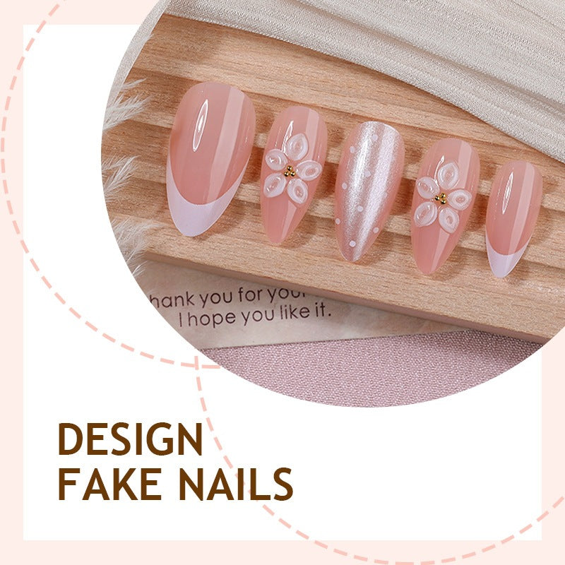 Artificial nail set with elegant French tips and delicate floral accents Stornfield