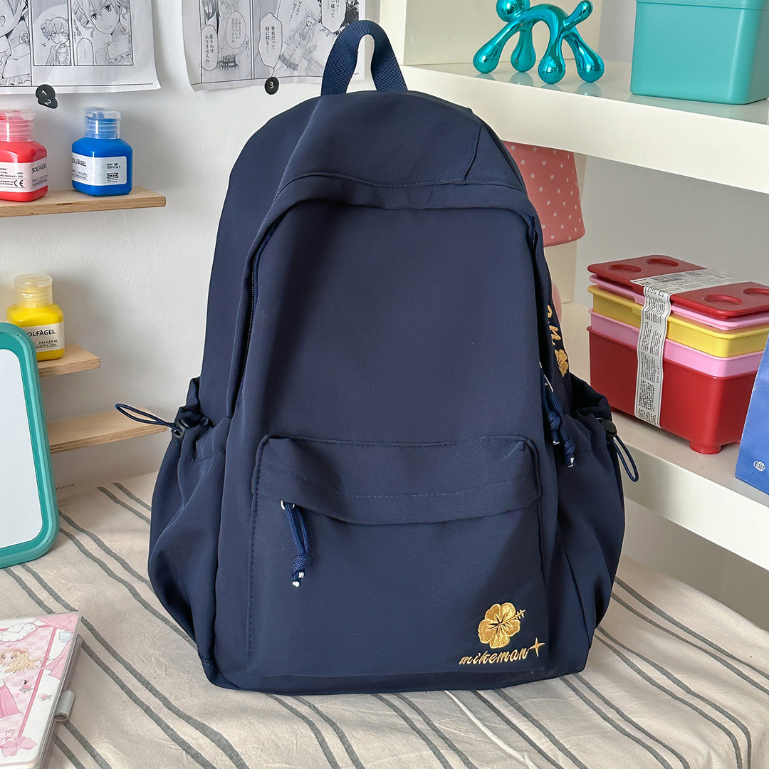 Versatile Lightweight Backpack with Decorative Accents Stornfield
