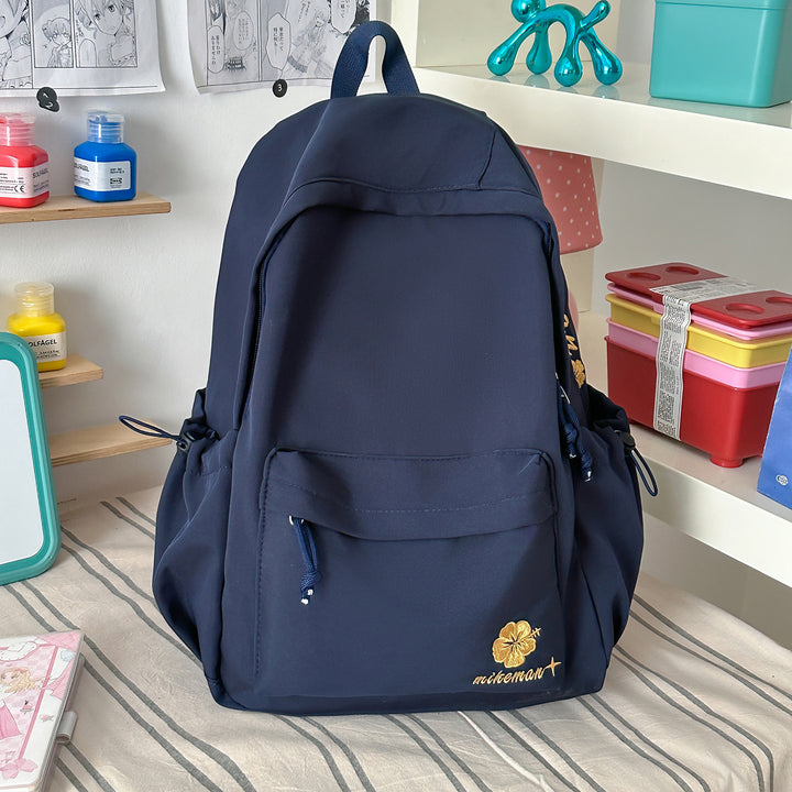 Versatile Lightweight Backpack with Decorative Accents Stornfield