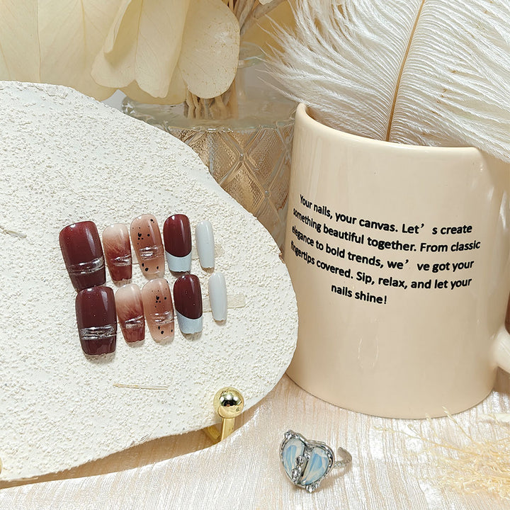 Trendy artificial nails with elegant metallic and gradient effects Stornfield