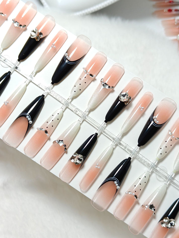 Elegant Artificial Nails with Glitter Accents and Fashionable Design Stornfield