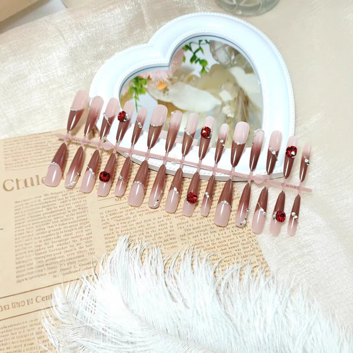Artificial nails with luxurious 3D decorations and glamorous accents Stornfield