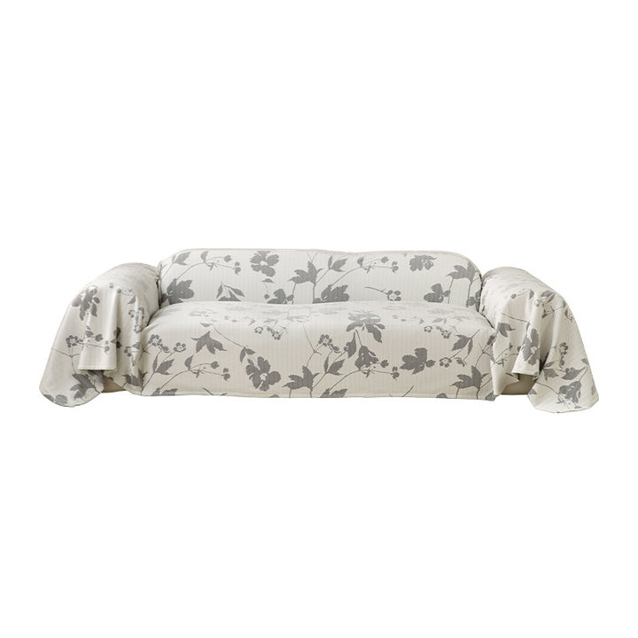 Generous sofa cover for 3-seater with floral jacquard structure