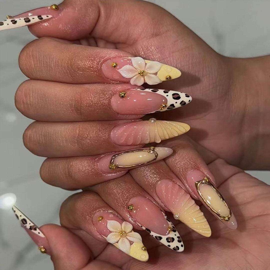 Artificial nail set with floral and golden applications Stornfield