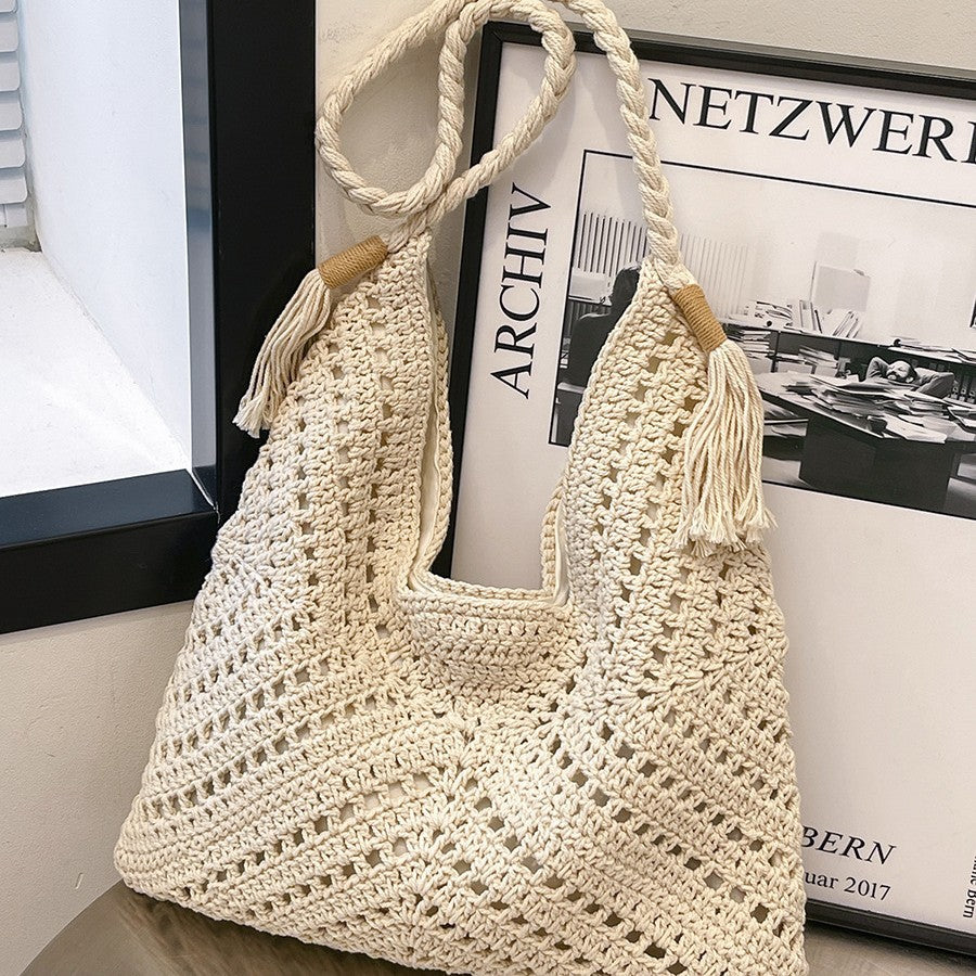 Hand-knotted shoulder bag with tassels and spacious interior Stornfield