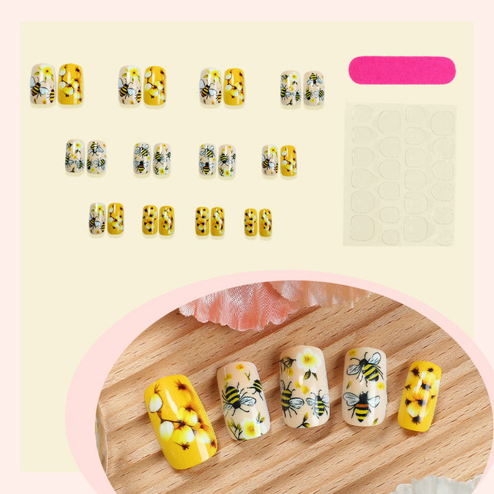 Artificial nail set with floral and bee motifs Stornfield