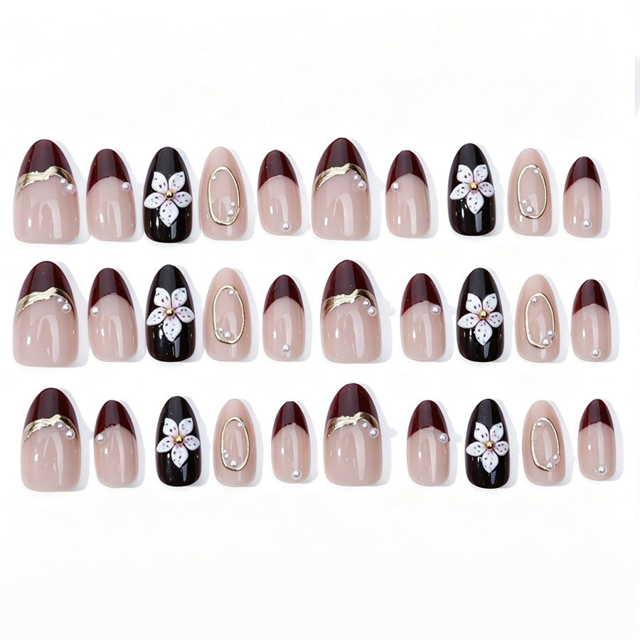 Artificial nail set with elegant flower and glitter details Stornfield