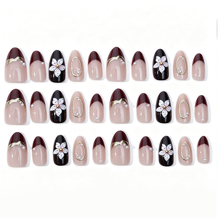 Artificial nail set with elegant flower and glitter details Stornfield