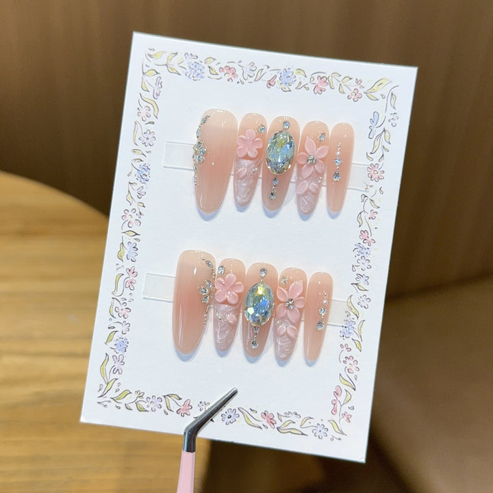 Artificial artificial nails with floral decorations and glitter details Stornfield