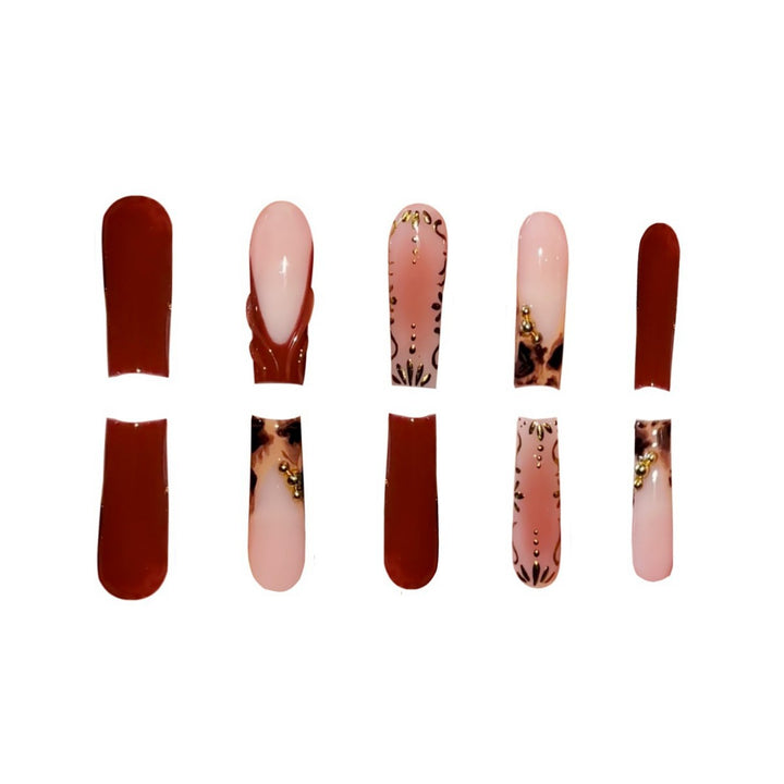 Artistic Long Press-On Nails with Elegant Gold Accents Stornfield