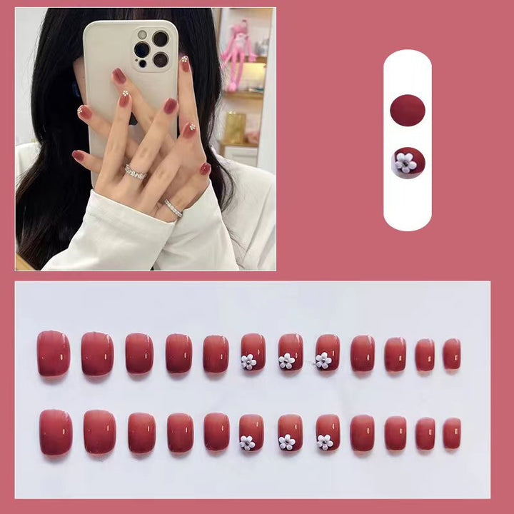 Elegant artificial nails with floral designs Stornfield