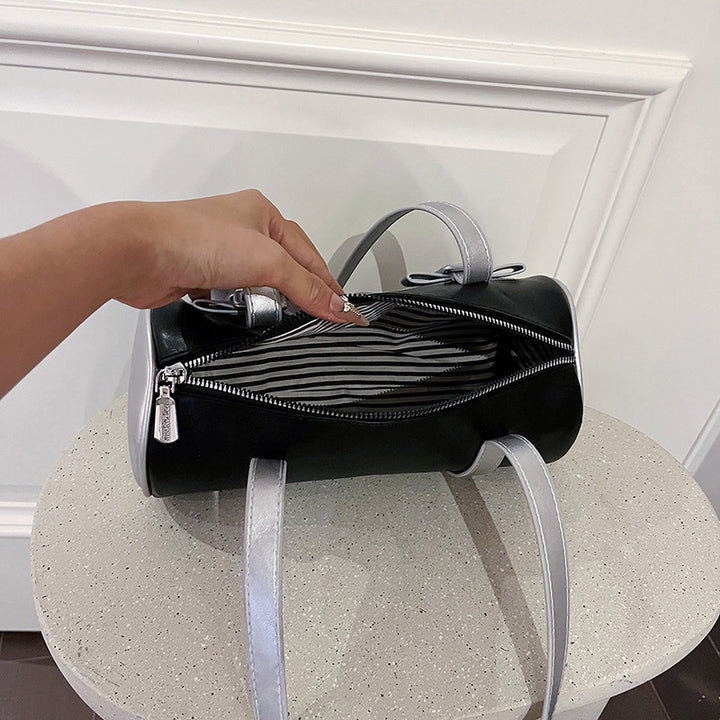 Bow-Accent Barrel Bag