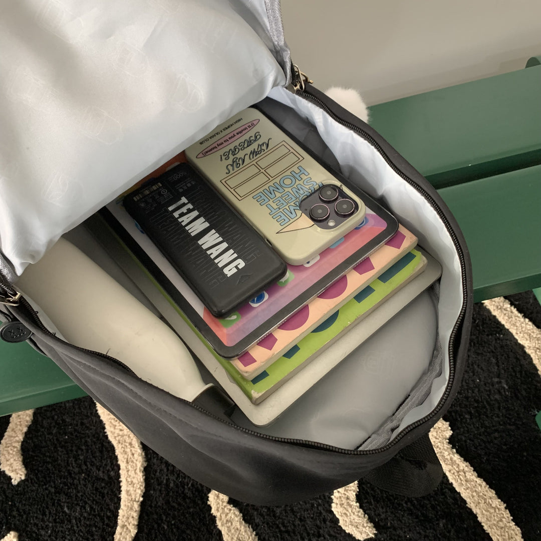 Practical backpack with colorful applications Stornfield