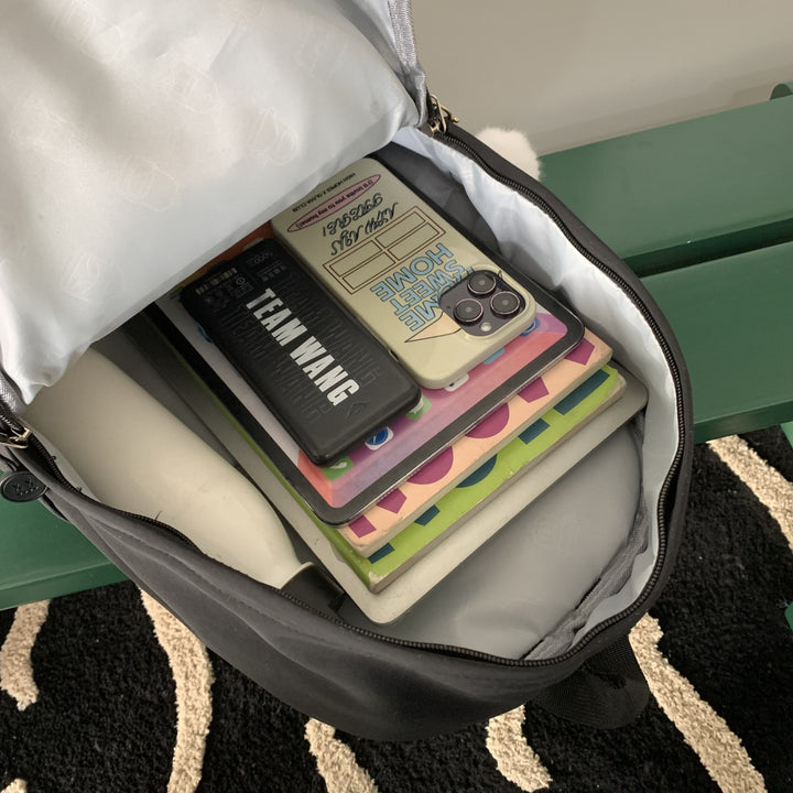 Practical backpack with colorful applications Stornfield