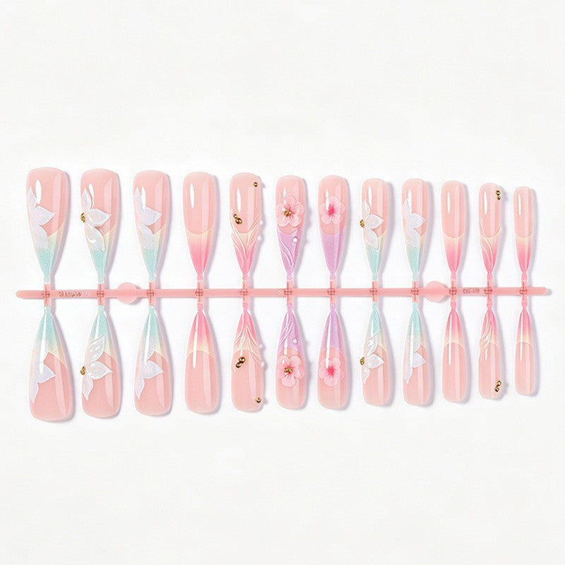 Artificial nail set with elegant flowers and delicate color gradients Stornfield