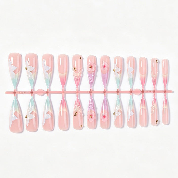 Artificial nail set with elegant flowers and delicate color gradients Stornfield