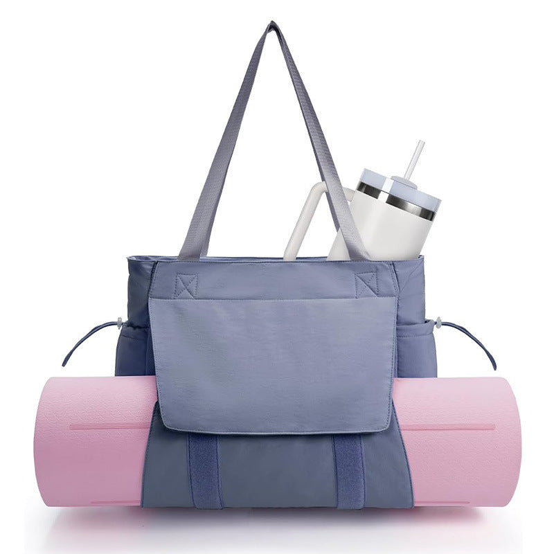 Versatile sports bag with separate yoga mat carrying compartment Stornfield