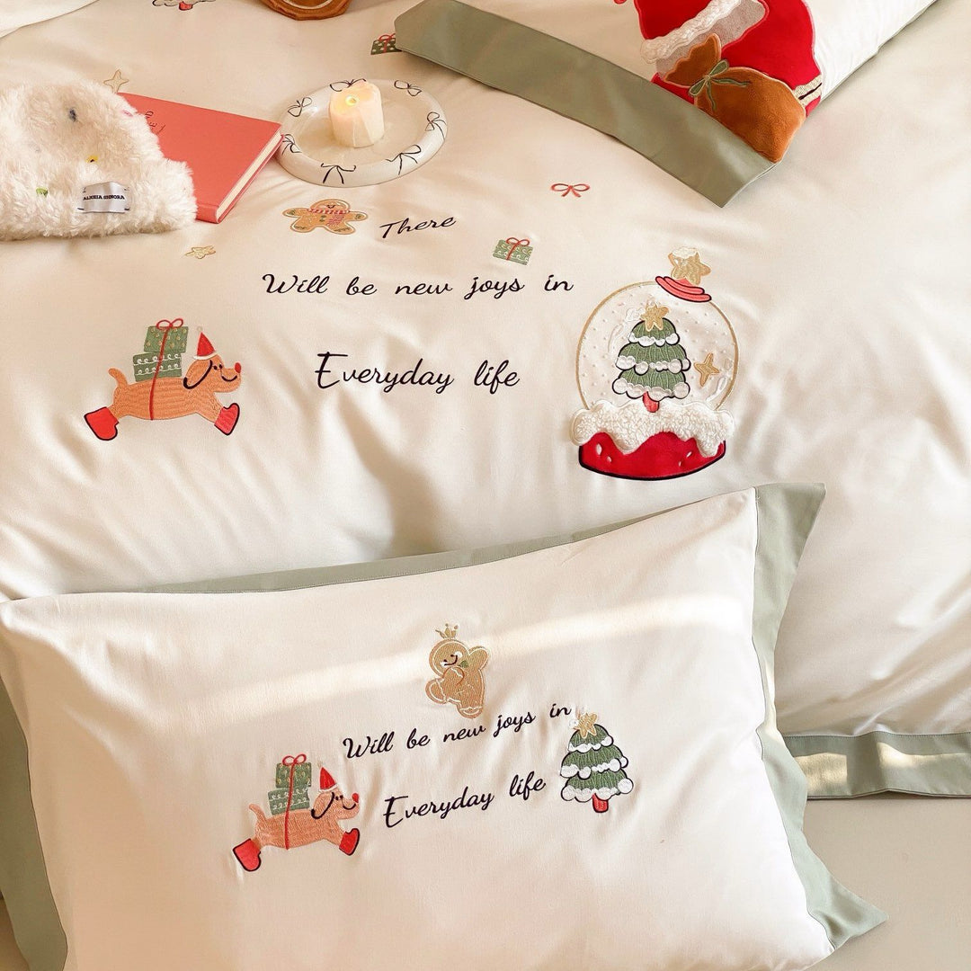 Festive cotton satin bedding set with embroidered Christmas motifs and contrasting borders