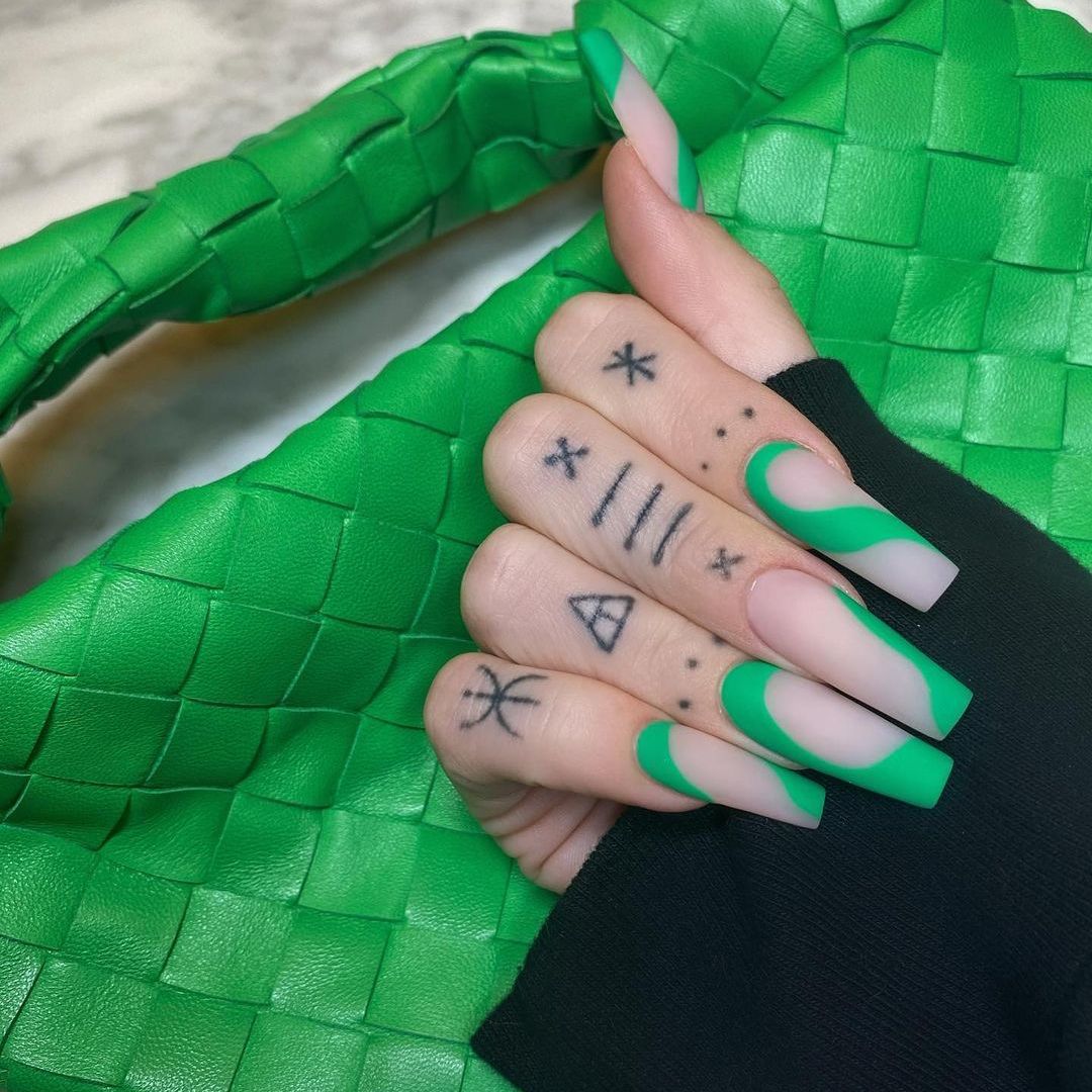 Artful nail art with modern French tip and colorful accents Stornfield