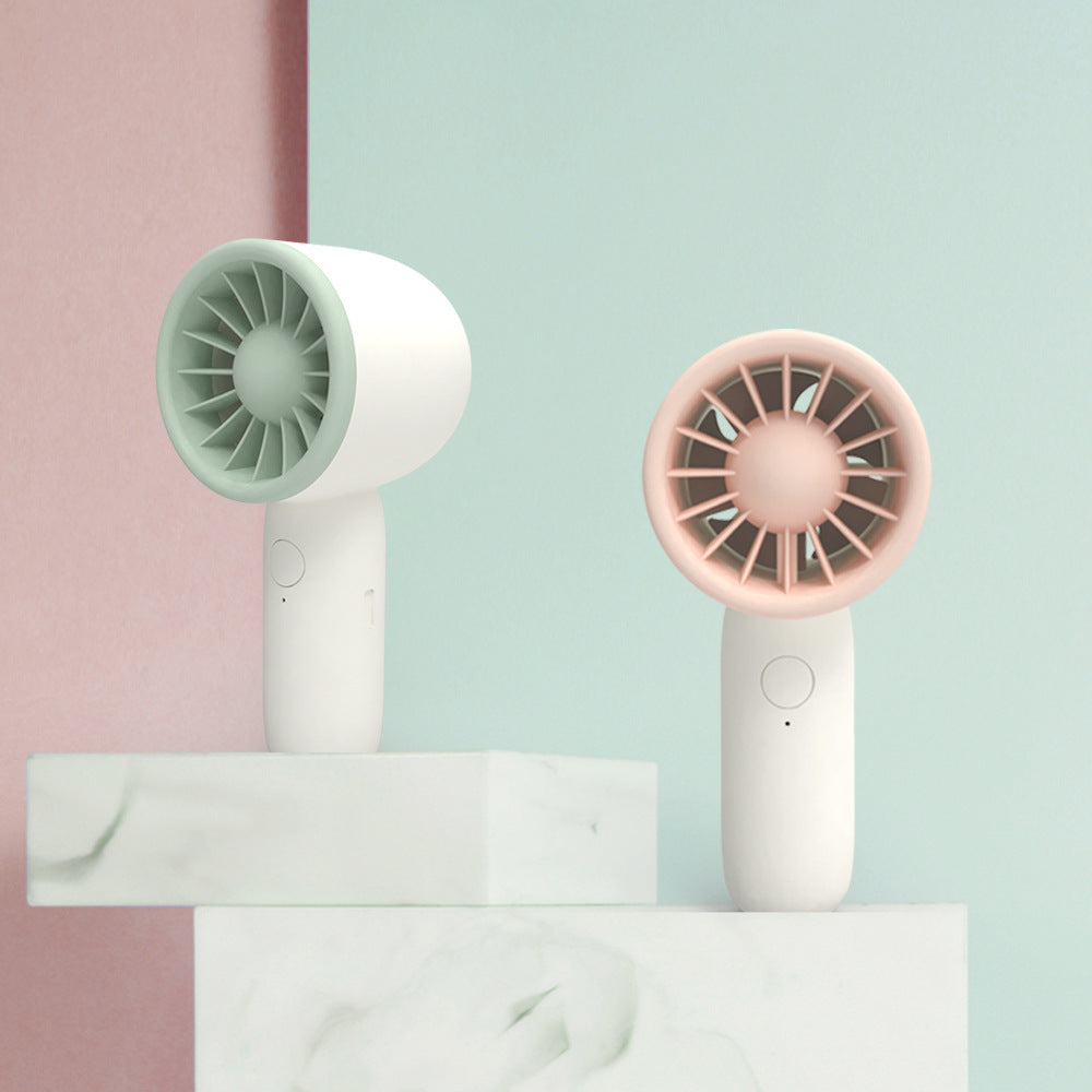 Unisex mini compact pocket fan with rechargeable battery, one-button operation and quiet DC motor Stornfield