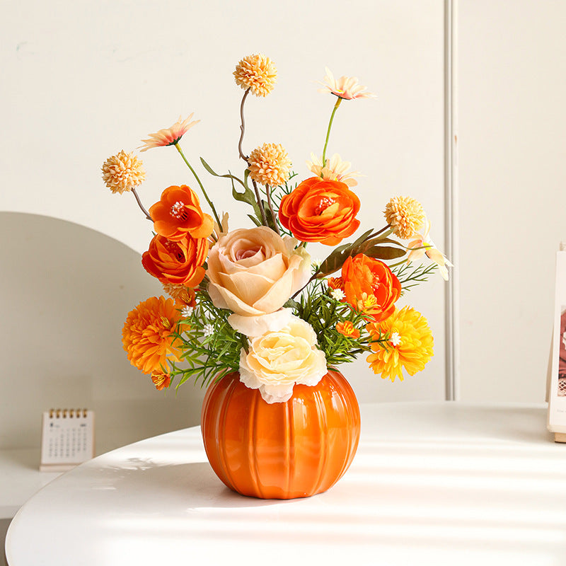 Lifelike Floral Arrangement in Decorative Ceramic Vase