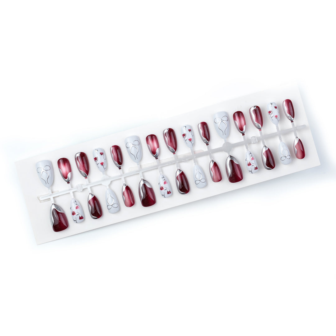 Elegant Artistic Press-On Nail Set with Glossy Finish and Floral Accents Stornfield