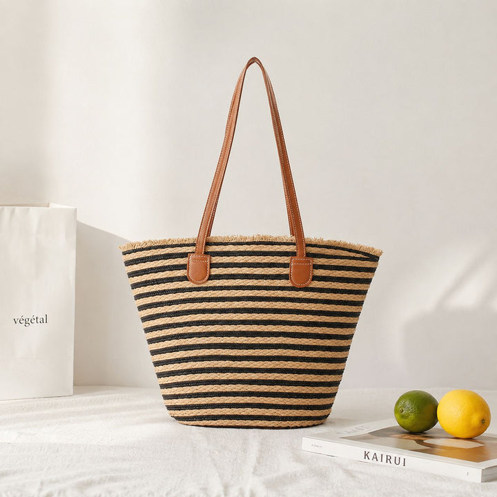 Elegant Bast shoulder bag with leather handles Stornfield