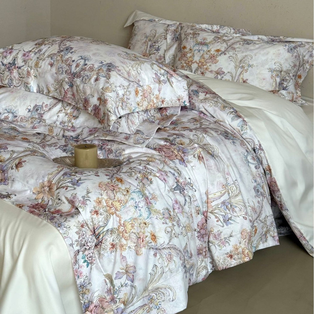 Fine cotton satin bed linen set with watercolor floral ornamentation and hotel closure