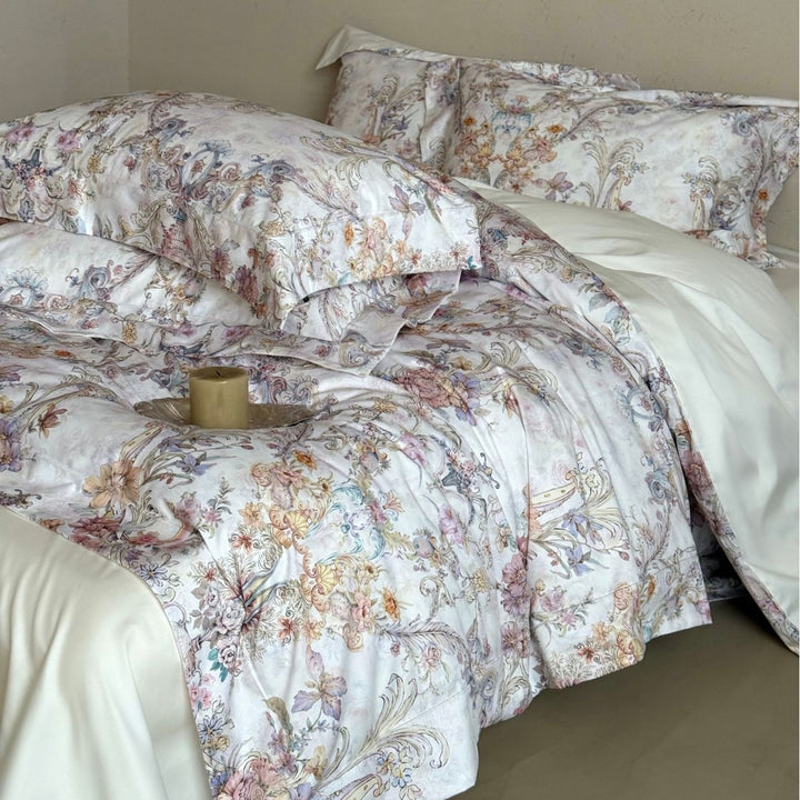 Fine cotton satin bed linen set with watercolor floral ornamentation and hotel closure