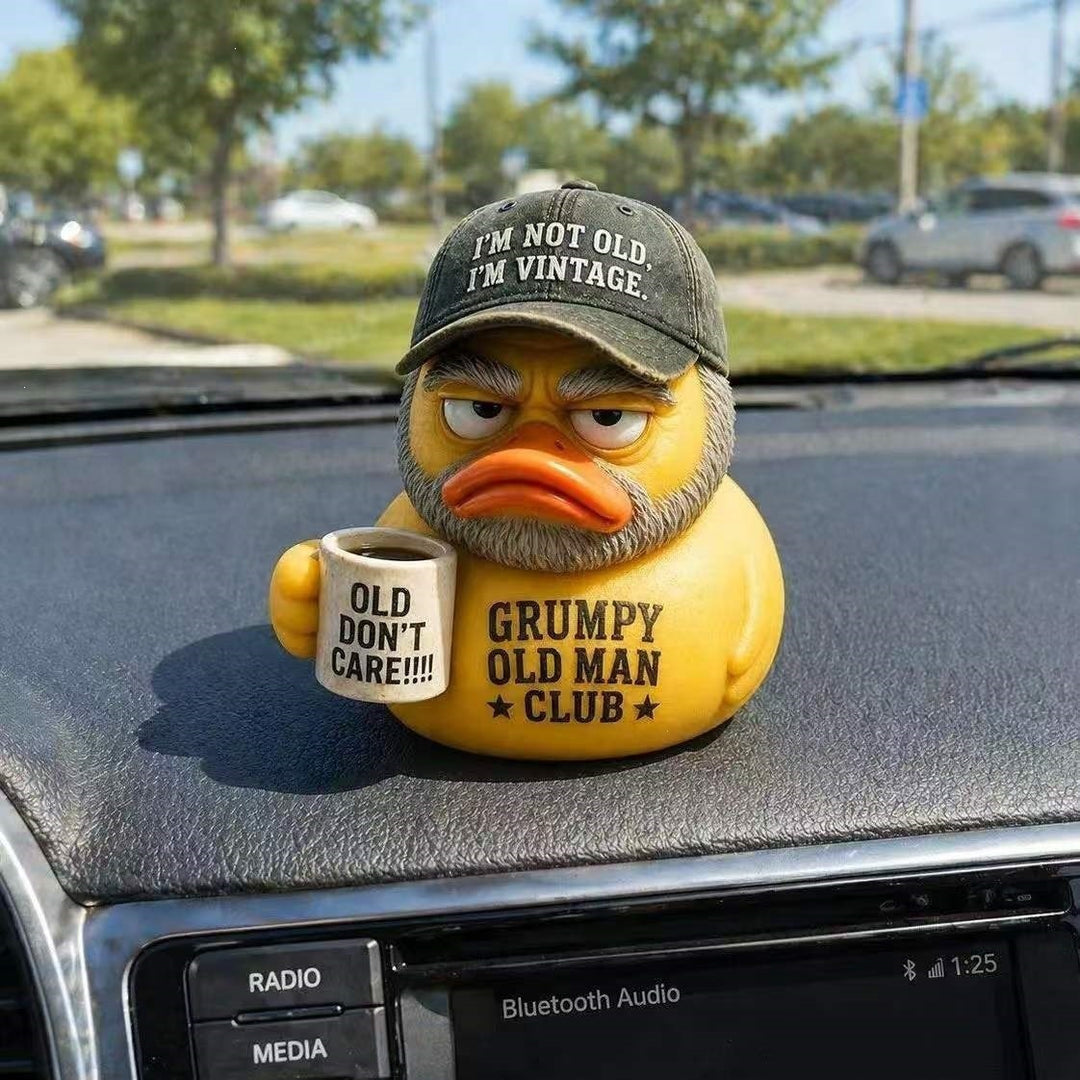 Funny rubber duck with vintage hat and cup Stornfield
