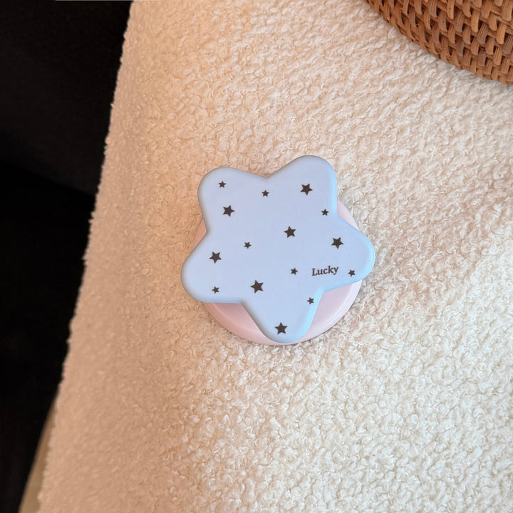 Playful smartphone holder in star design Stornfield