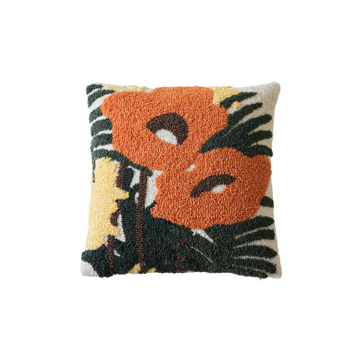 Hand-tufted decorative cushion with abstract graphic design and textured cotton surface