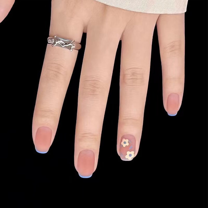 Creative nail design with floral accents Stornfield