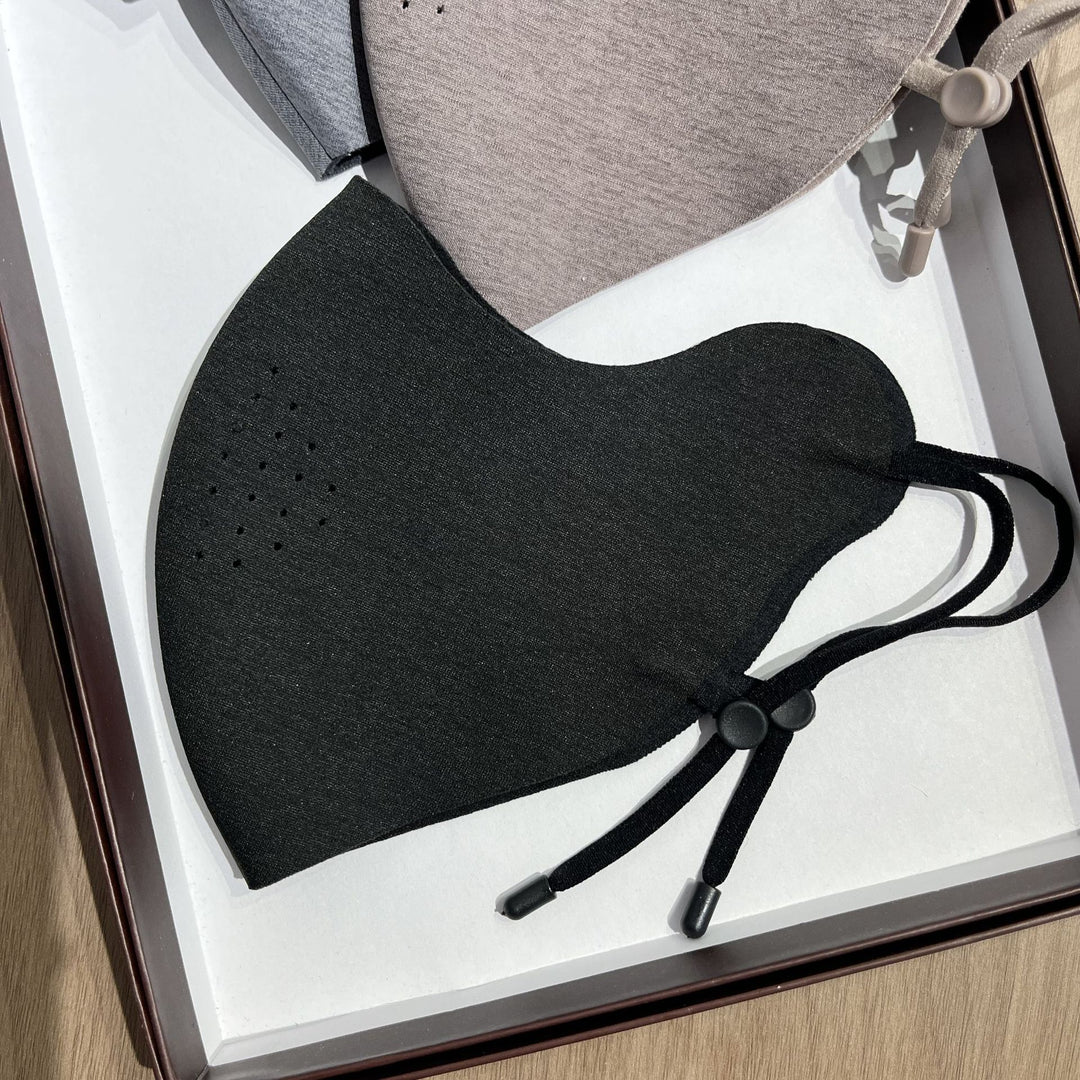 Contoured Reusable Breathable Fabric Face Mask with Adjustable Toggle Ear Loops and Micro Vent Perforations Stornfield
