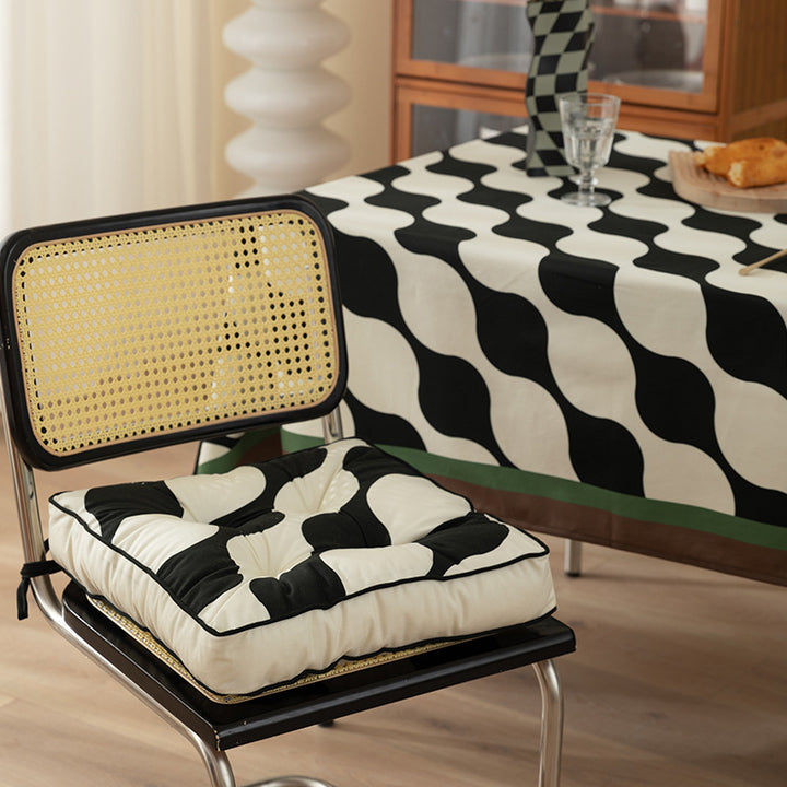 Padded chair cushion with ties and tufted seat Stornfield