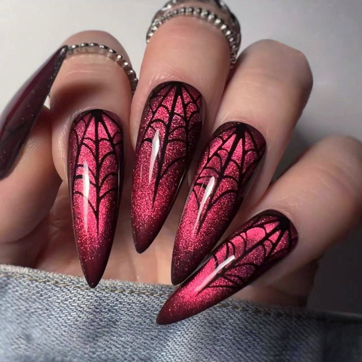 Creative Stiletto Nail Art with Blood Red Accents Stornfield