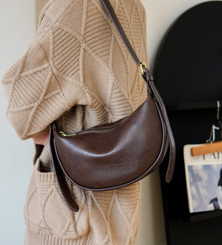 Sleek Crescent Shaped Crossbody Bag Stornfield