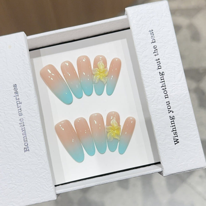 Artificial nails with enchanting ombre effect and floral accents Stornfield