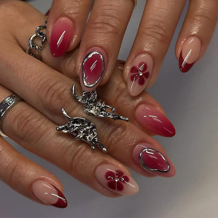 Artificial nail set with elegant flower and ombre accents Stornfield