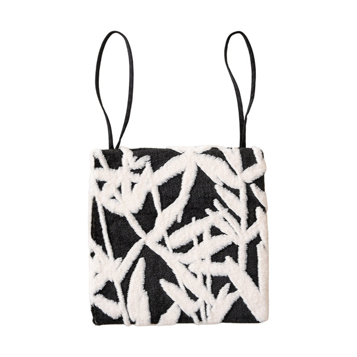 Padded seat cushion with hand-tufted leaf pattern and fastening ties Stornfield