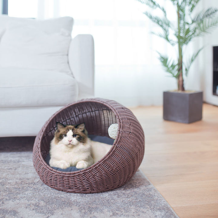 Cozy cat bed made of woven natural material Stornfield