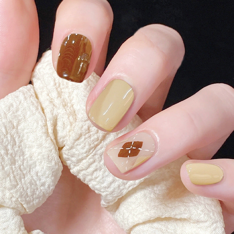 Artful nail extensions with an elegant leaf pattern Stornfield