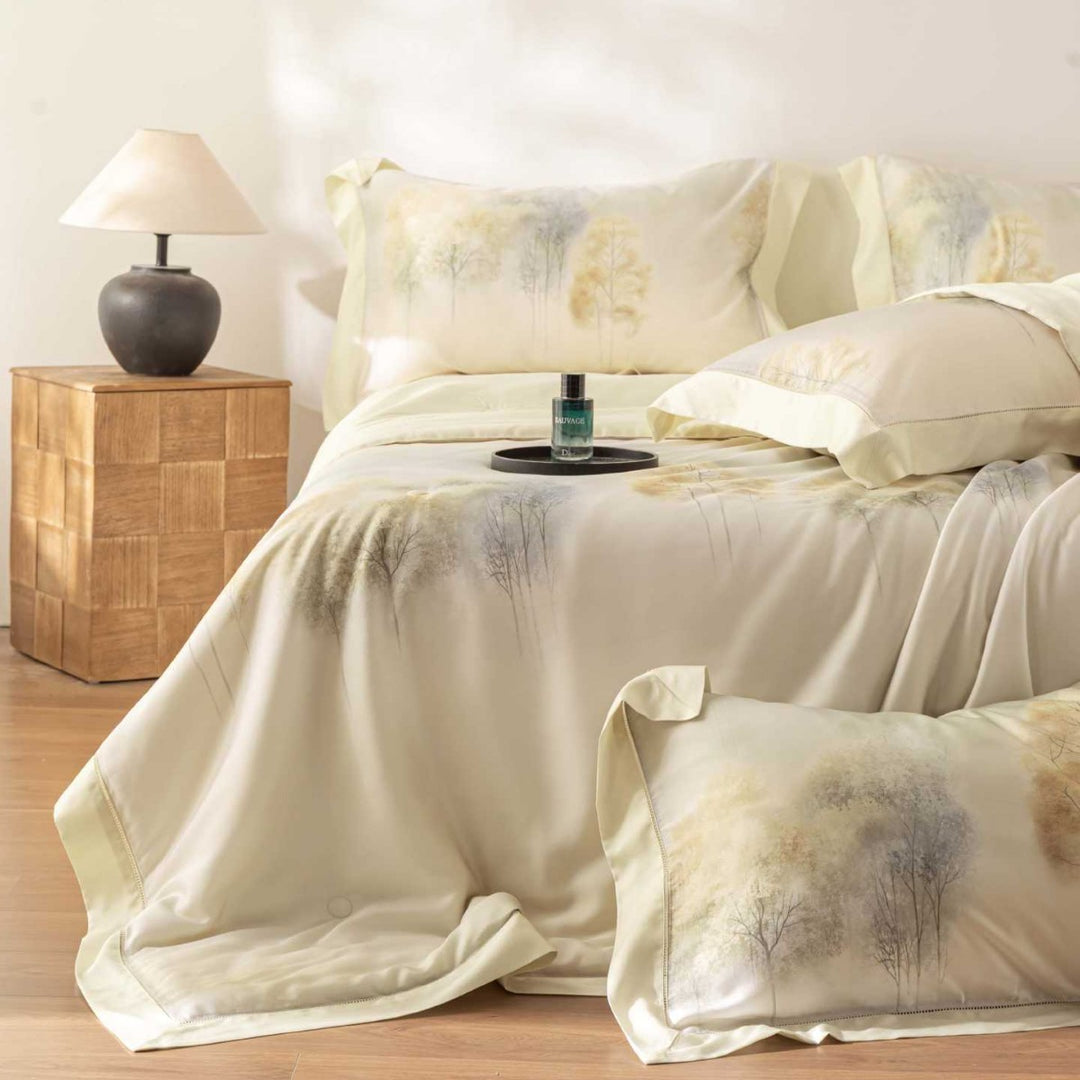 Luxurious cotton satin bedding set with delicate leaf design and hem detail